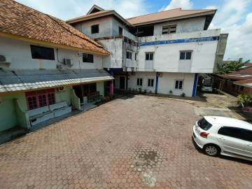 Dijual Tanah dan Bangunan di tengah kota dan di tepi jalan aspal Jl. Taskurun - Pekanbaru