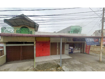 Di jual rumah beserta ruko 2 lantai dan 3 kios 1 lantai lokasi dekat Jalan Sudirman
